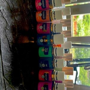 Opened young living essential oils, glitter roller bottles & crystal roller tops